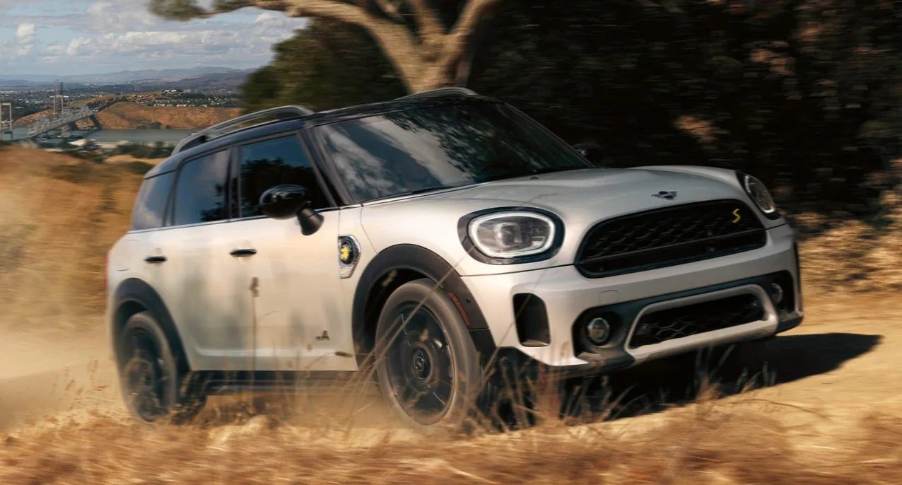 The MINI Cooper SE Countryman PHEV driving on dirt terrain. MINIDemo2 in Derwood MD